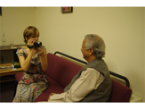 GAYLE FINDS A QUIET MOMENT TO INTERVIEW PROF. YUNUS BACKSTAGE AT TUFTS